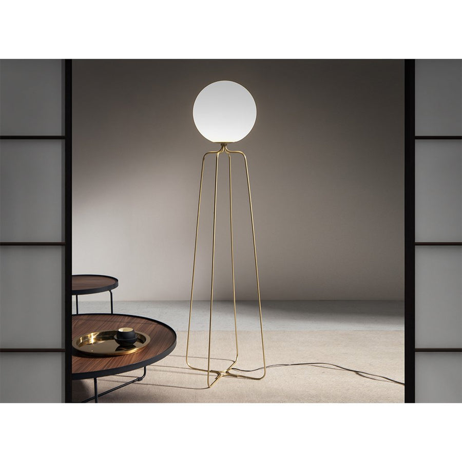 ANGEL CERDA - Floor lamp with gold-colored steel base and white tinted glass ball.