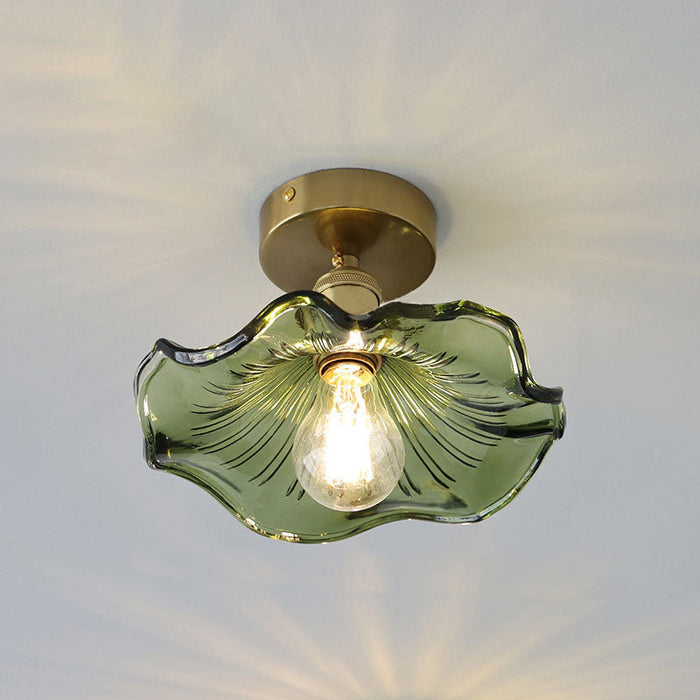 Glass ceiling lamp in the shape of a hibiscus