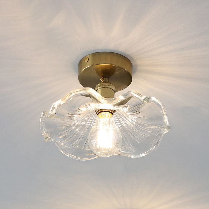 Glass ceiling lamp in the shape of a hibiscus